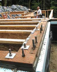 Base of the framing is bolted to concrete